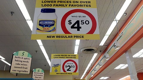 Winn-Dixie 'New Regular Price' Ceiling Signs