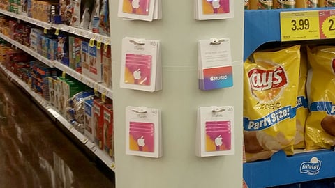 iTunes Ralphs 'The Gift That Keeps on Giving' Standee