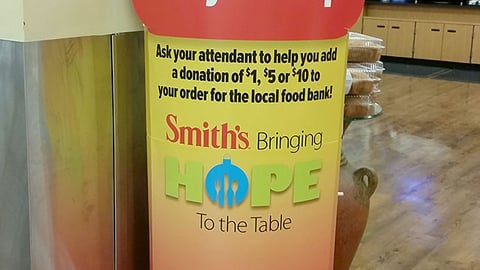 Smith's 'Can You Help?' Standee