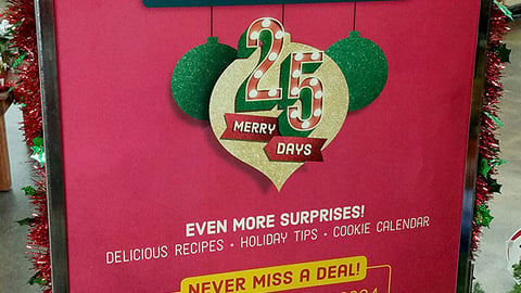 Smith's 'Unwrap New Deals' Stanchion Sign