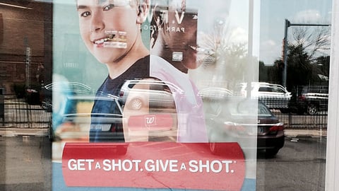Walgreens 'Get a Shot. Give a Shot' Window Poster