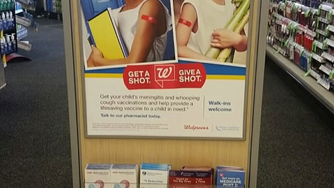 Walgreens 'Get a Shot. Give a Shot' Stanchion Sign