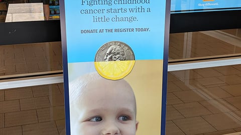 Aldi Alex's Lemonade Stand Foundation 'Pay Your Quarter Forward' Stanchion Sign