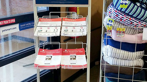 PetSmart 'Buy a Bag, Give a Meal' Rack Sign