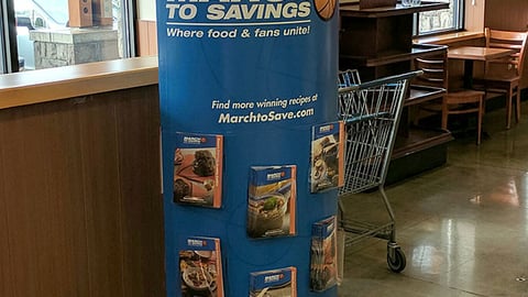 QFC 'March to Savings' Standee