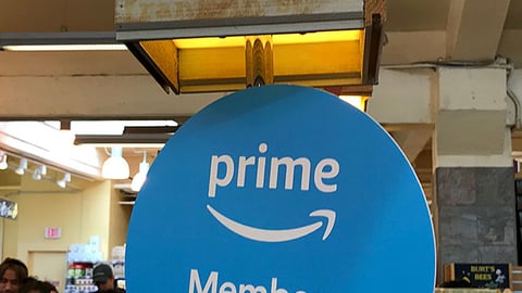 Whole Foods 'Prime Members Save More' Checkout Sign