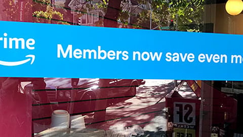 Whole Foods 'Prime Members Now Save Even More' Window Cling