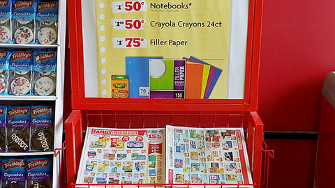 Family Dollar 'Save Up to 70% on School Supplies' Rack Sign