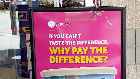 SE Grocers 'Why Pay the Difference?' Stanchion Sign