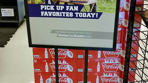 Fry's 'Pick Up Fan Favorites Today' Stanchion Sign