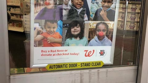 Walgreens 'We're Committed To Keeping Kids Healthy' Entrance Sign