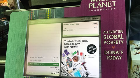 Whole Foods 'Alleviating Global Poverty' Checkout Sign