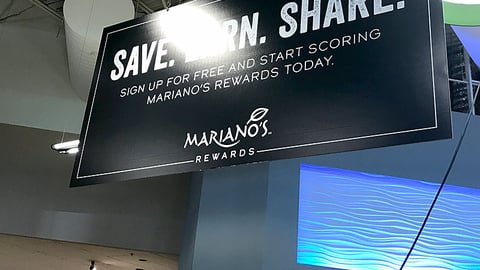 Mariano's 'Save. Earn. Share' Ceiling Sign