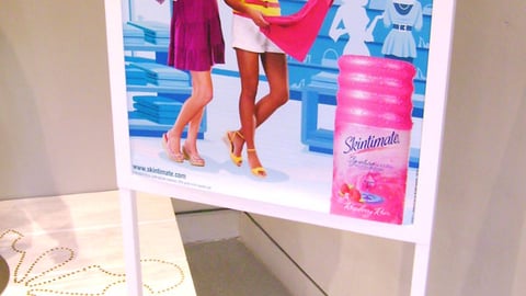 Delia's Skintimate Stanchion Sign 