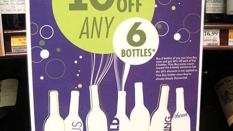 Whole Foods '10% Off' Wine Shelf Sign