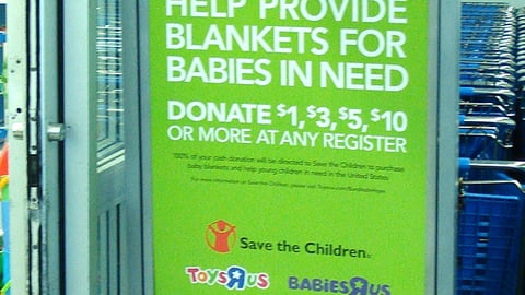 Toys "R" Us 'Bundled in Hope' Stanchion Sign