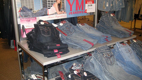 YMI Jeanswear Table Display