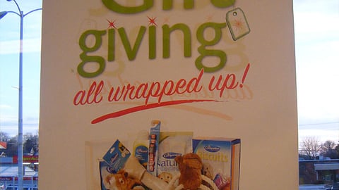 Giant-Carlisle Companion 'Gift Giving' Window Poster
