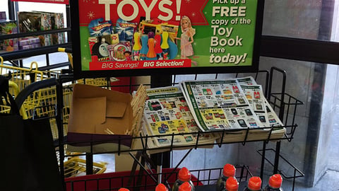 Dollar General 'Toy Book' Rack Sign