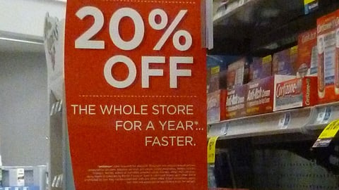 Rite Aid Wellness+ '20% Off' Aisle Violator