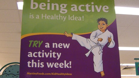 Martin's 'Being Active' Ceiling Sign