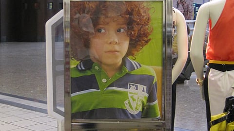 JCPenney 'Free Kids' Haircuts' Stanchion Sign