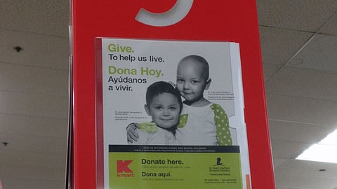 Kmart 'Thanks and Giving' Checkout Sign