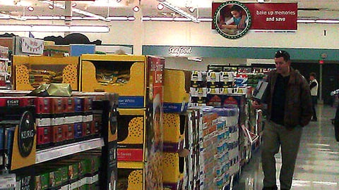 Meijer 'Give in Good Taste' Ceiling Sign