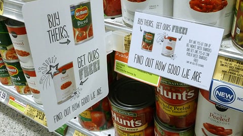 Publix 'Buy Theirs, Get Ours Free' Shelf Signs