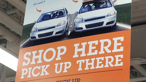 Bed Bath & Beyond 'Pick Up There' Ceiling Sign