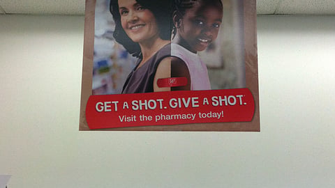 Walgreens 'Get a Shot, Give a Shot' Ceiling Sign