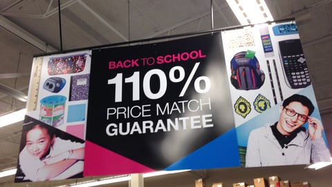 Staples '110% Price Match Guarantee' Ceiling Sign